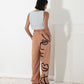 Calça de alfaiataria nude pintada à mão vista traseira - terezas